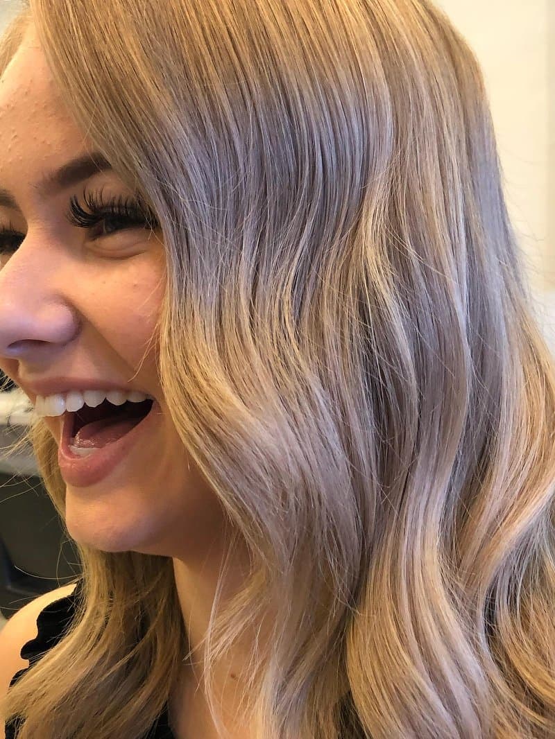 Cool-toned blonde, side profile